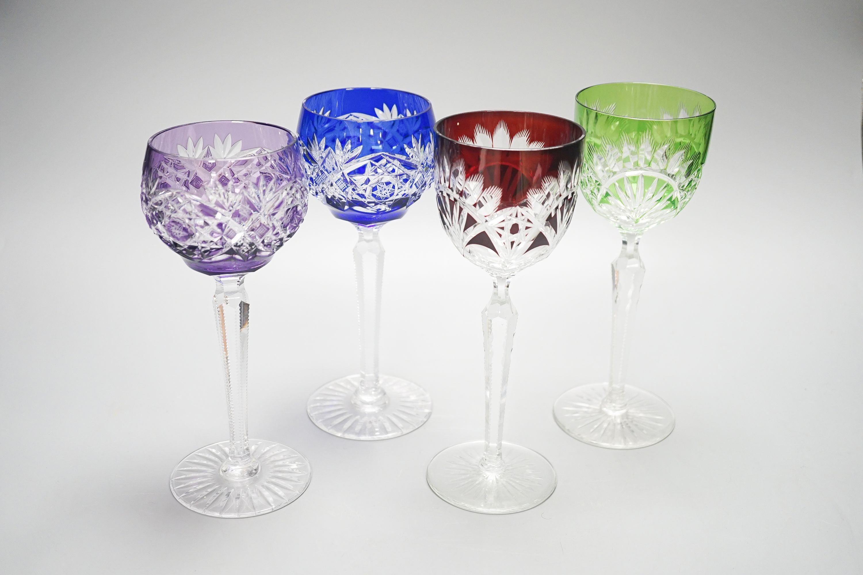 Two harlequin sets of six cut and colour flashed Hock glasses, tallest 21 cm(12)